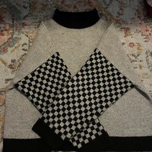 Checkered black and grey turtleneck sweater